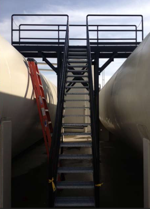 a platform installed between two tanks